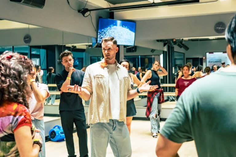 Dance instructor leading a class at Danznik Studios during Flow Fridays event